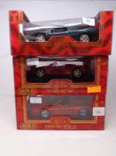 Three Mira 1:18 die cast vehicles - Ferrari F50, Ferrari 348 and a Ferrari 512 TR,