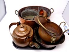A tray of antique copper ware, twin handled cooking pot, miniature coal bucket,