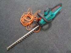 A Bosch electric hedge trimmer