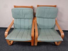A pair of Ikea armchairs