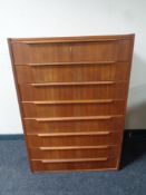 A mid century Danish teak eight drawer chest