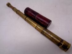 A 19th century brass five draw pocket telescope in case