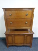 An oak blanket box together with an oak two drawer chest