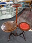 A mahogany wine table with lift off tray together with a further wine table with leather inset