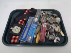 A tray of boxed and unboxed silver plated cutlery,