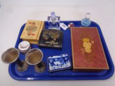 An Art Deco style two-tone glass perfume bottle, together with musical jewellery box,