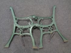 A pair of cast iron bench ends