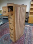 An Edwardian pine four drawer index chest