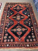 A Caucasian Kazak rug,