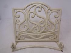 A cast iron painted cookery book stand