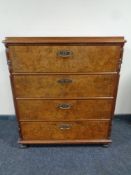 A 19th century walnut four drawer chest