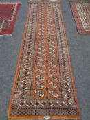An Afghan Bokhara runner, signed,