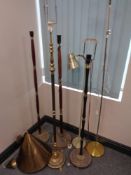 A 20th century brass conical light fitting together with six continental floor lamps