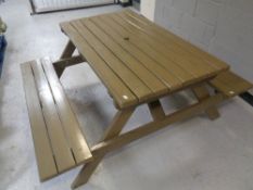 A painted wooden picnic bench