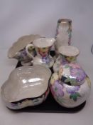 A tray containing six pieces of Maling Petunia patterned china together with a Maling Tyneside