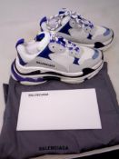 A pair of Balenciaga trainers,
