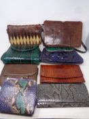 A box of lady's leather handbags