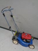 A Honda petrol lawn mower