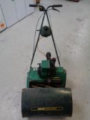 A Qualcast Suffolk punch petrol lawn mower