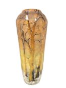 A French Art Nouveau Daum Nancy vase depicting a snow covered forest scene,
