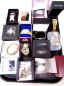 A tray containing boxed lady's and gents wristwatches including Sekonda,