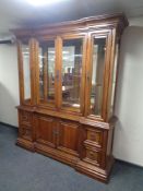 A good quality Barker and Stonehouse Stuart Furniture inverted breakfronted display cabinet fitted
