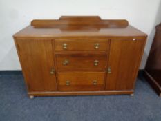 An Edwardian mahogany double door sideboard