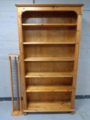 A set of pine shelves together with a pine cd stand