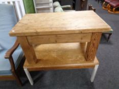 A pine coffee table on chunky legs together with a 20th century Nathan teak coffee table on painted
