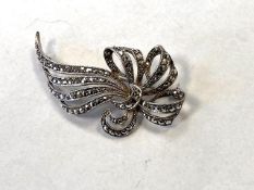A Silver Marcasite brooch.