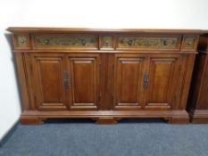 A good quality Barker and Stonehouse American style four door sideboard fitted with five drawers