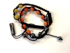 Two costume bracelets.