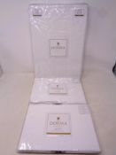 A Dorma Super King quilt cover together with two pillow cases in Alice pattern fabric