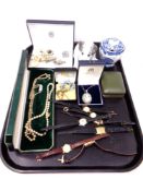 A tray of vintage wrist watches, Russian dog figure,