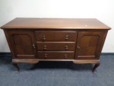 An Edwardian mahogany Queen Anne style sideboard