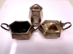 A three piece silver cruet set
