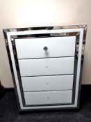 A contemporary Cimc Home all glass four drawer chest
