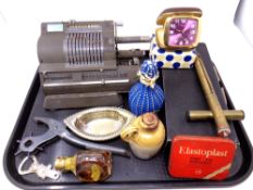 A vintage adding machine together with leather stamp,