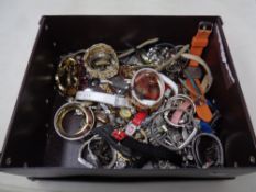 A box containing a large quantity of assorted lady's and gent's wrist watches.