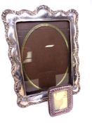 Two silver photograph frames