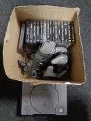 A Playstation one console with leads and accessories together with 15 assorted games