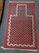 An Afghan prayer rug,