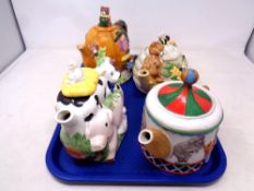 A Staffordshire tableware Christopher Wren circus teapot together with three further novelty