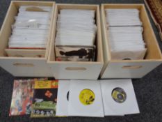 Three wooden boxes containing vinyl 7