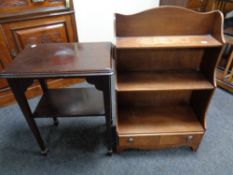 An Edwardian two-tier occasional table together with a set of Regency style mahogany waterfall