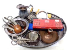 A silver plated gallery tray together with assorted plated and metal wares to include photo frames,