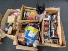 A pallet containing new shop stock, fun snaps, fruit squeezers, salt and pepper pots, hand saws,