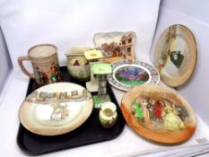 A tray containing nine pieces of Royal Doulton china to include Oliver Twist tankard,
