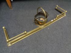 A Victorian brass fire curb together with a coal bucket