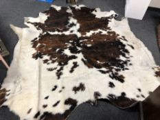 A cowskin (white/brown)